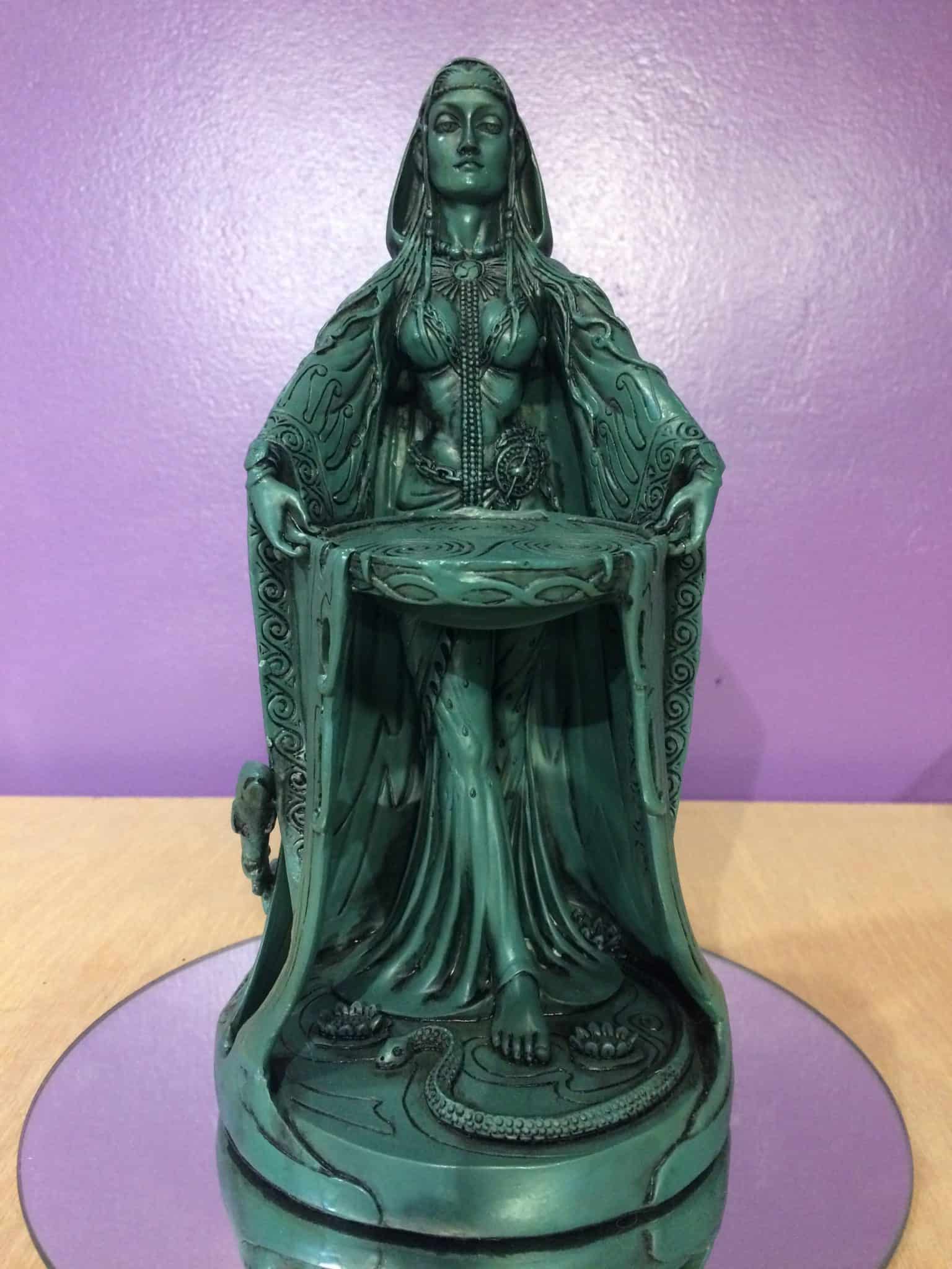 green statue of danu