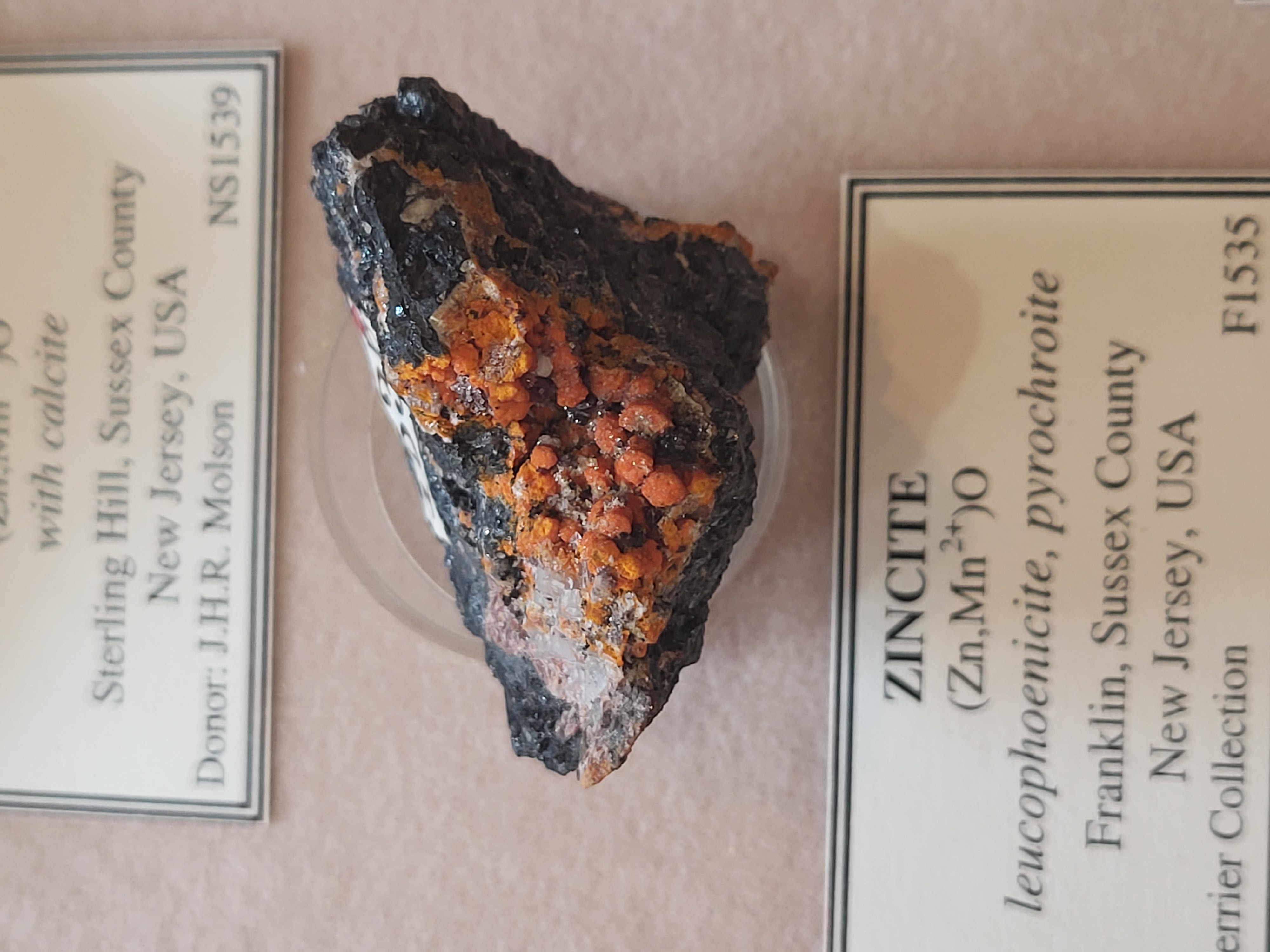 a crystal in a museum display case.